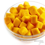 Side view of a bowl of cubed butternut squash