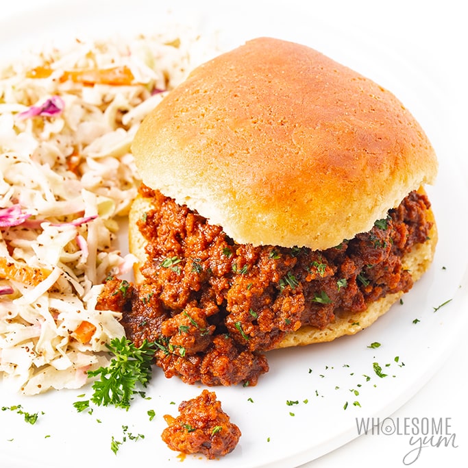 Low carb sloppy joes on a bun with coleslaw