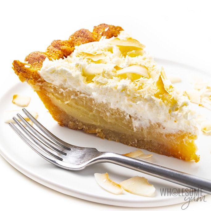 Low carb coconut cream pie on a plate with a fork