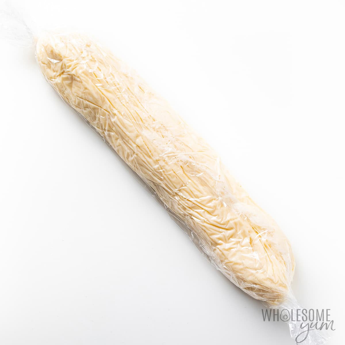 Cream cheese mixture rolled into a log and wrapped tightly.