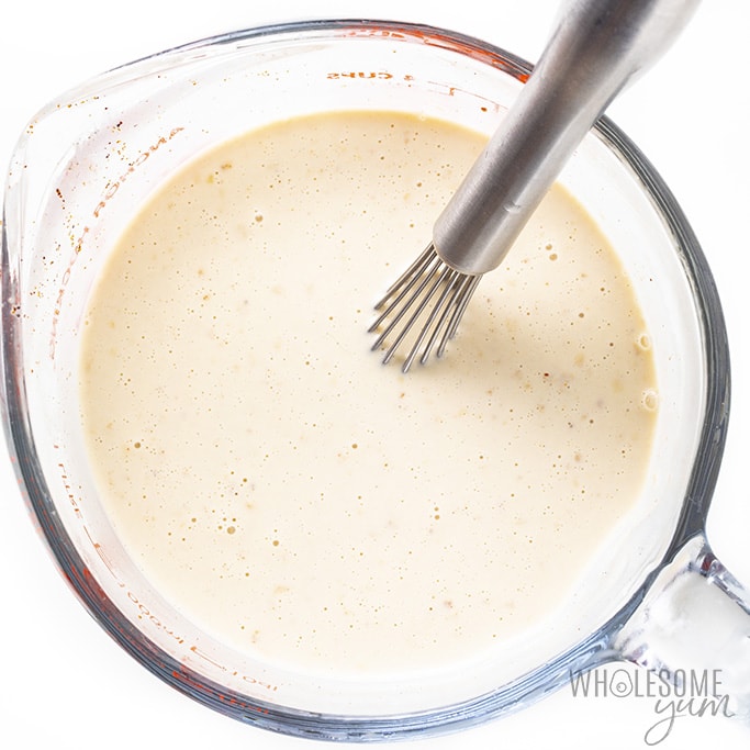 Sugar-free eggnog in a glass pitcher for chilling