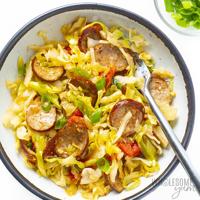 Keto cabbage and sausage in a bowl.