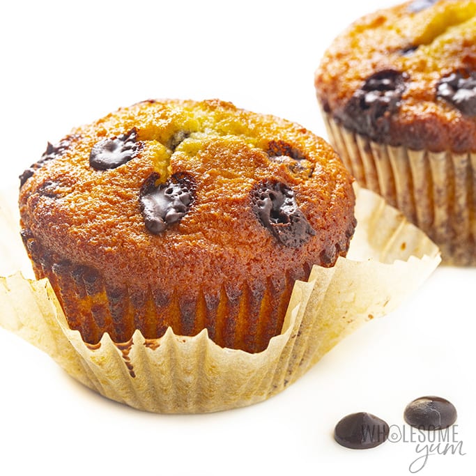 Almond flour chocolate chip muffin with liner peeled back