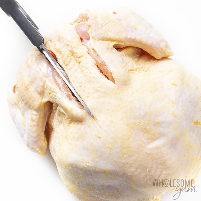 Picture showing how to spatchcock a chicken with kitchen shears