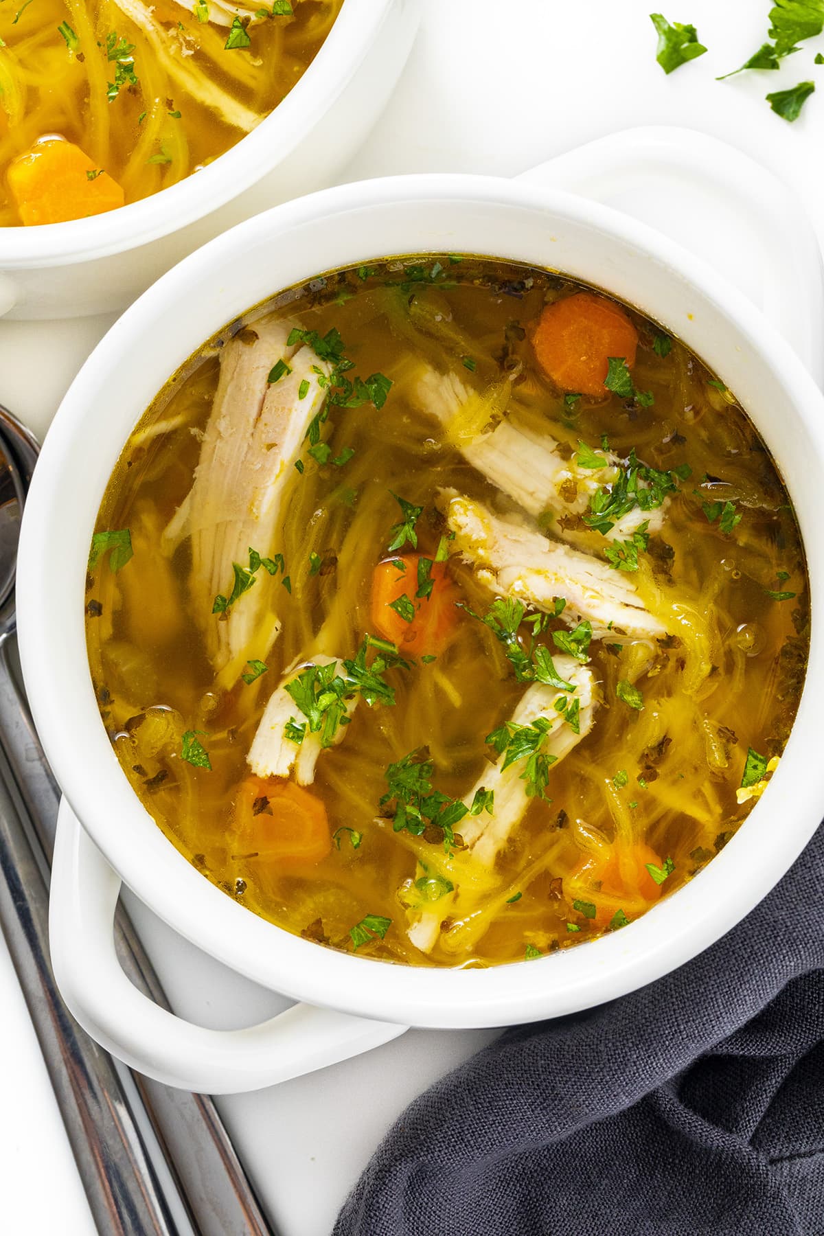 Low carb chicken soup in a bowl.