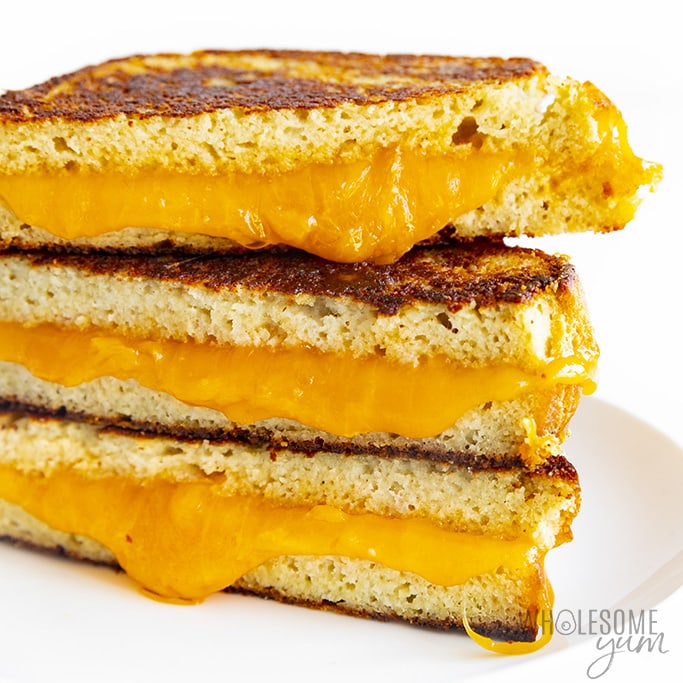 Keto grilled cheese stacked with cheese oozing out