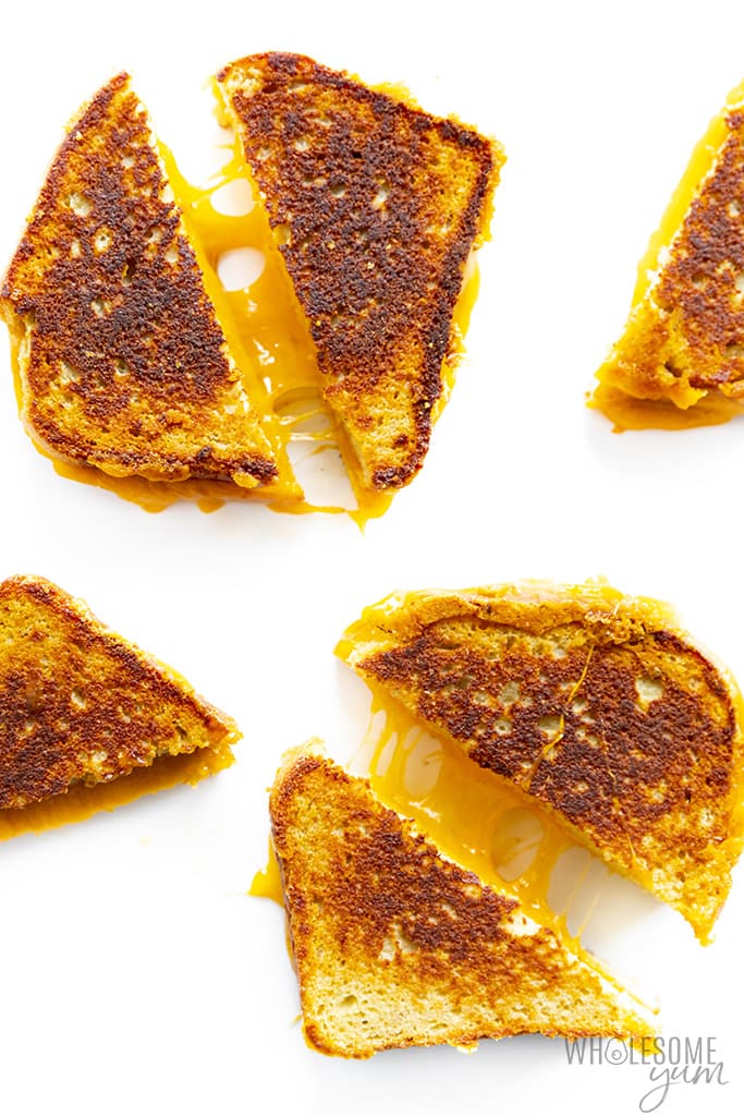 Keto grilled cheese sandwiches on a white surface