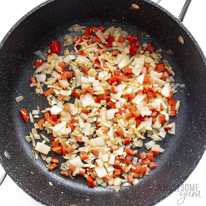 Sauteed vegetables in a skillet.