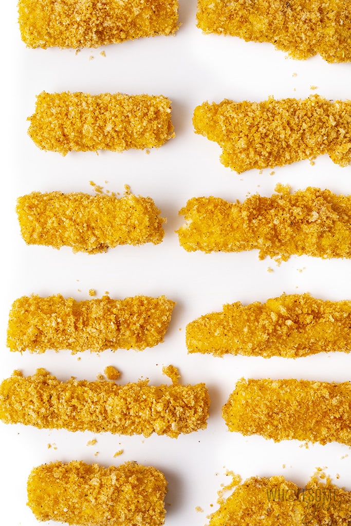 Coated raw fish pieces for keto fish sticks