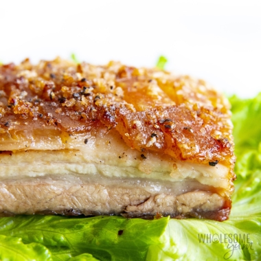 Crispy pork belly recipe plated on lettuce