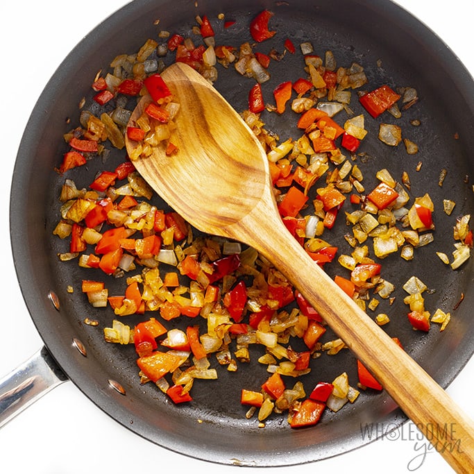 Skillet with sauteed onion and pepper