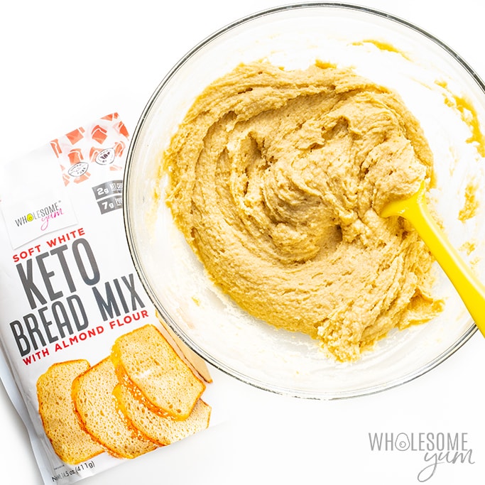 Stirring keto yeast bread batter with almond flour