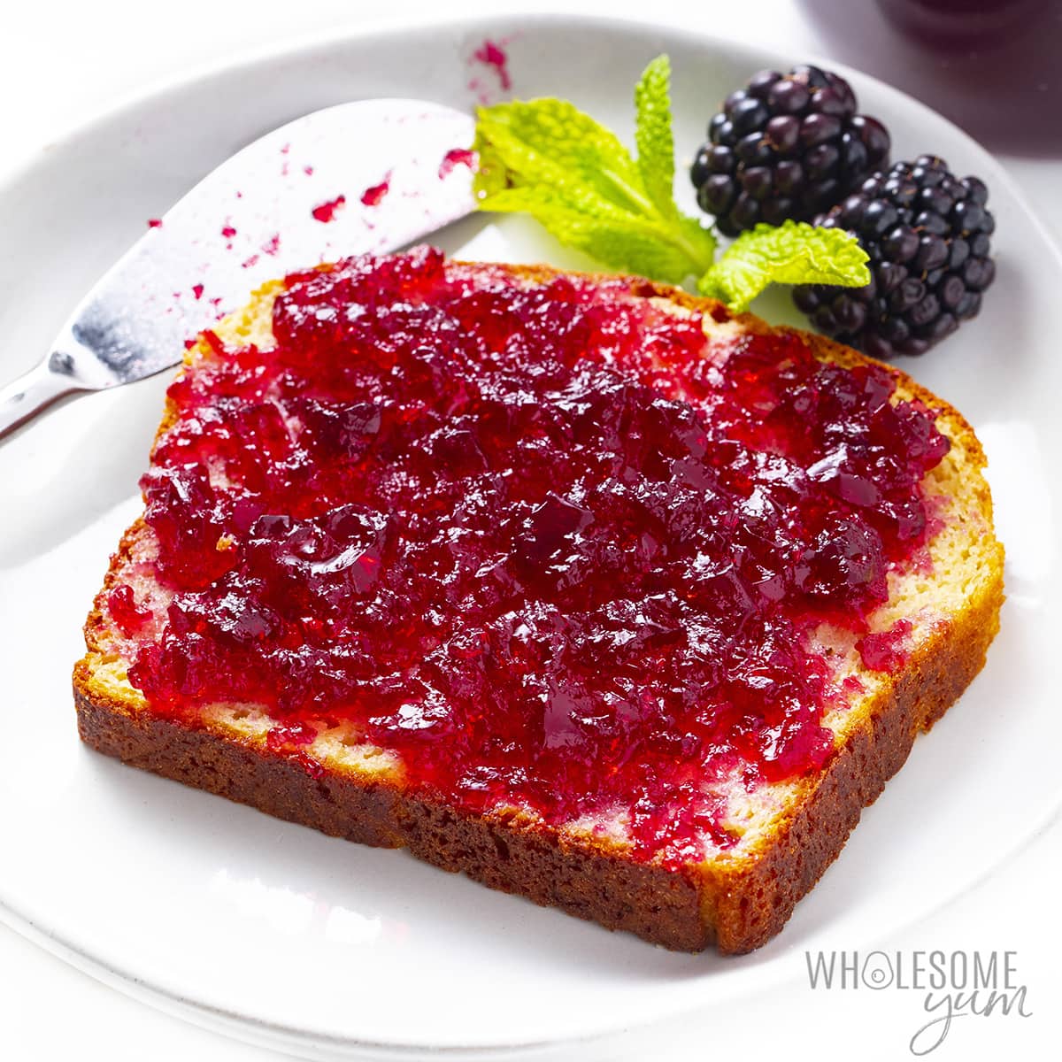 Keto jelly recipe shown on a slice of low carb bread