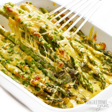 Asparagus casserole scooped out with a spatula.