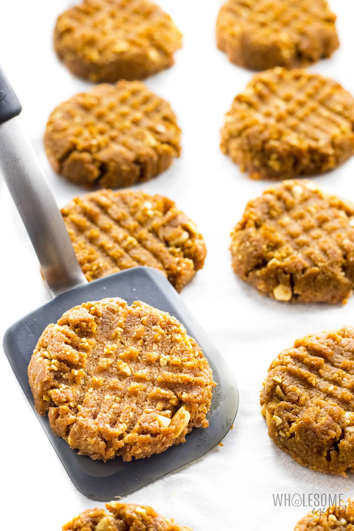 Keto peanut butter cookie recipe close up on a spatula.