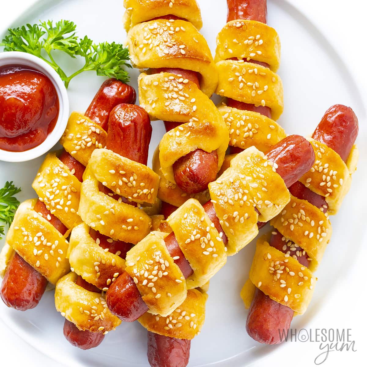 Keto pigs in a blanket on a plate