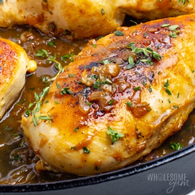 Perfect pan seared chicken breast recipe close up in a skillet