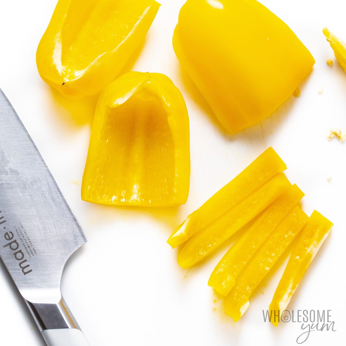 Yellow bell peppers sliced into strips.