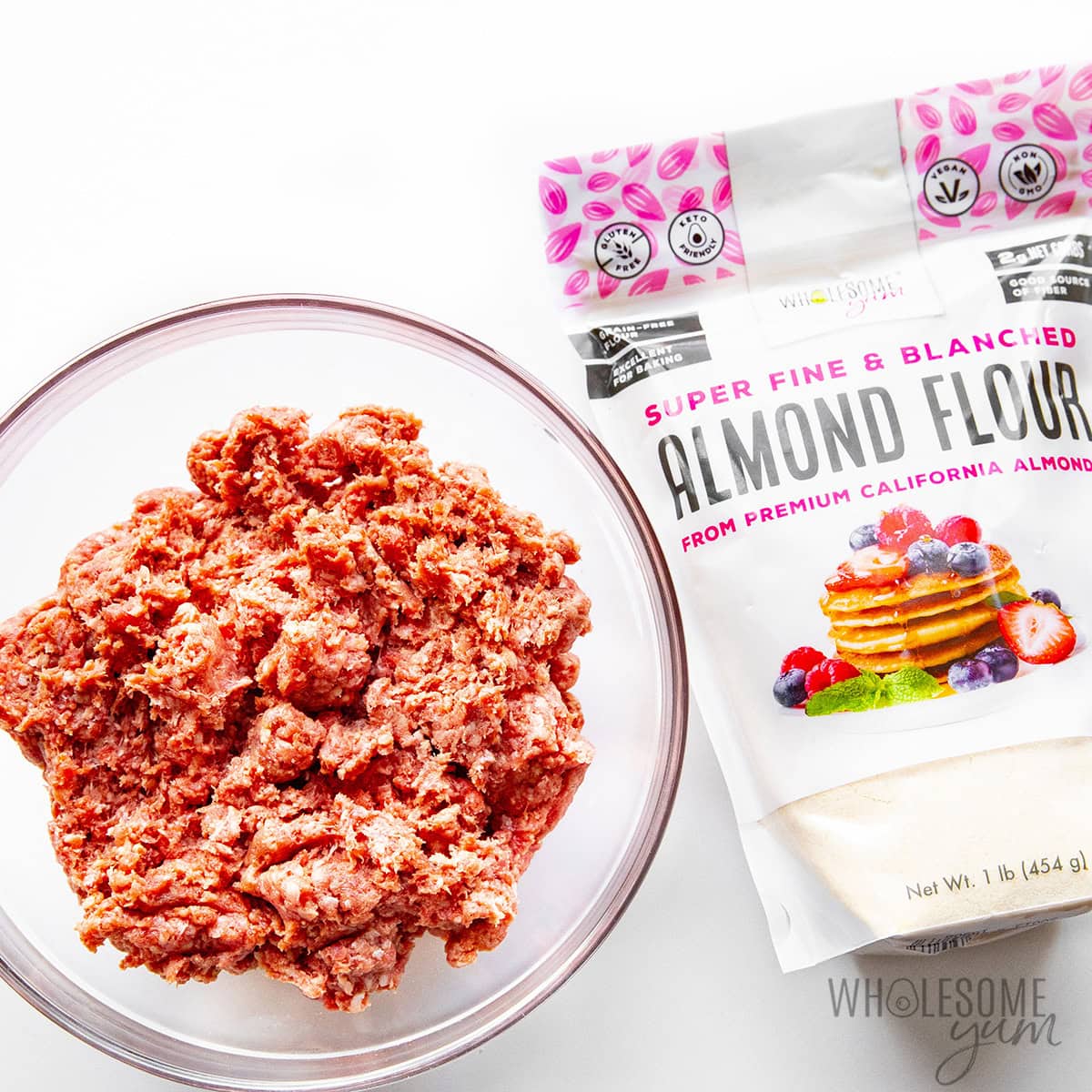 Beef mixture for Salisbury steak patties mixed in a bowl.