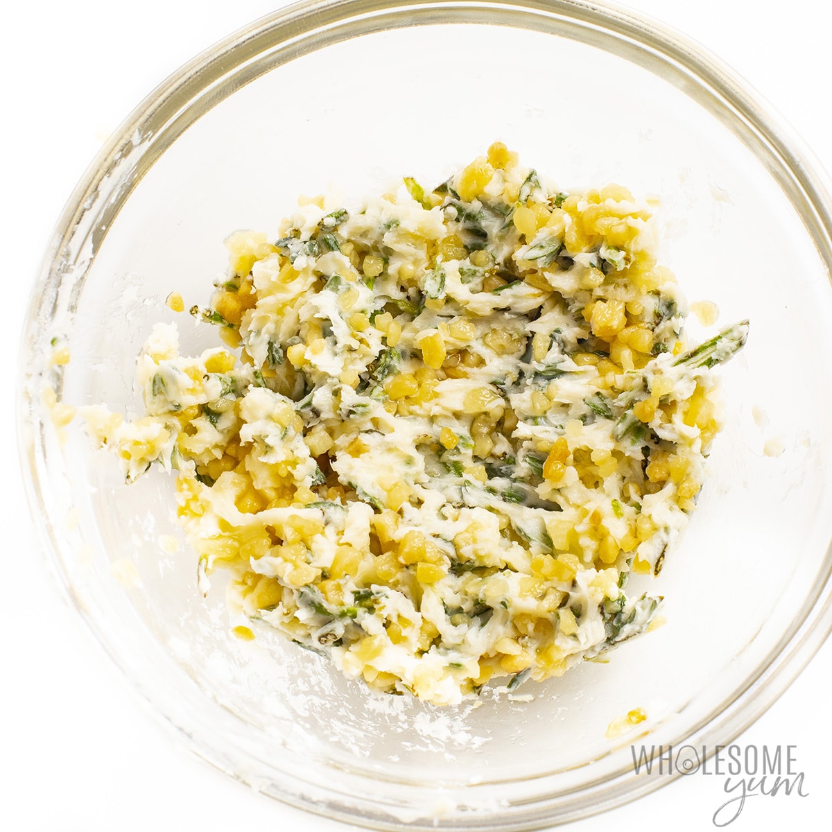 Garlic herb butter in a bowl.