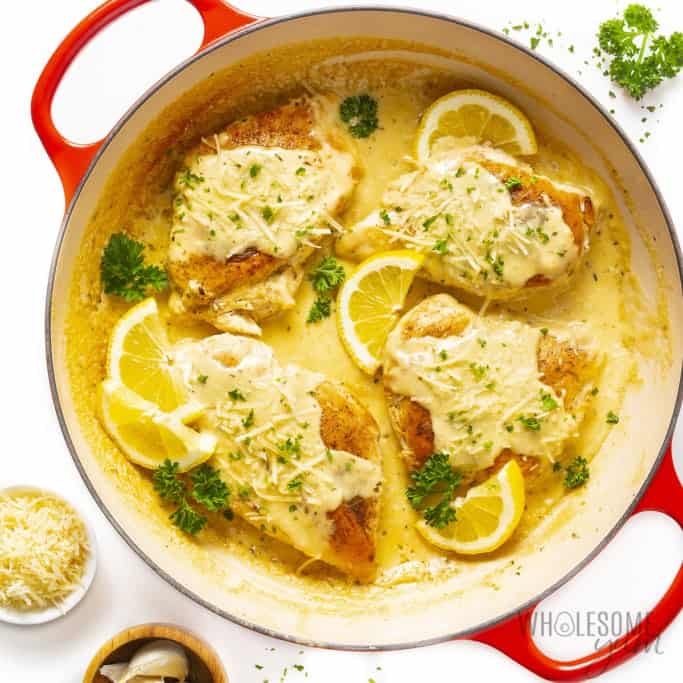 Creamy lemon parmesan chicken in a pan