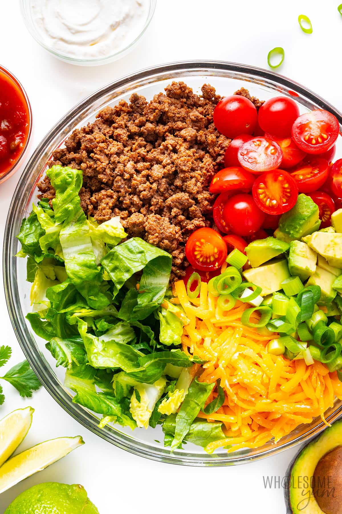 Taco salad bowl with ingredients separated.