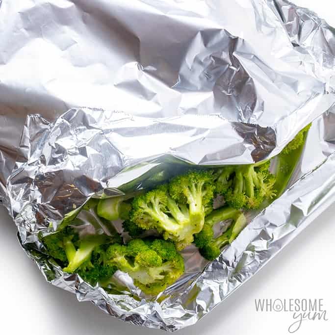 Grilling broccoli in foil.
