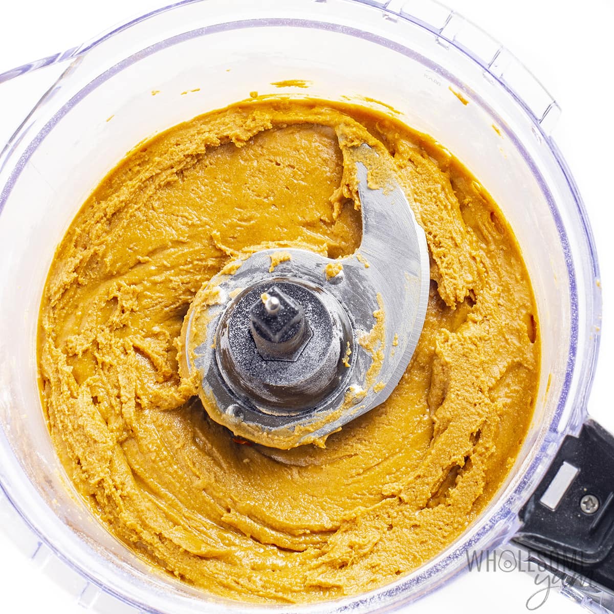 Peanut butter and other ingredients in a food processor.