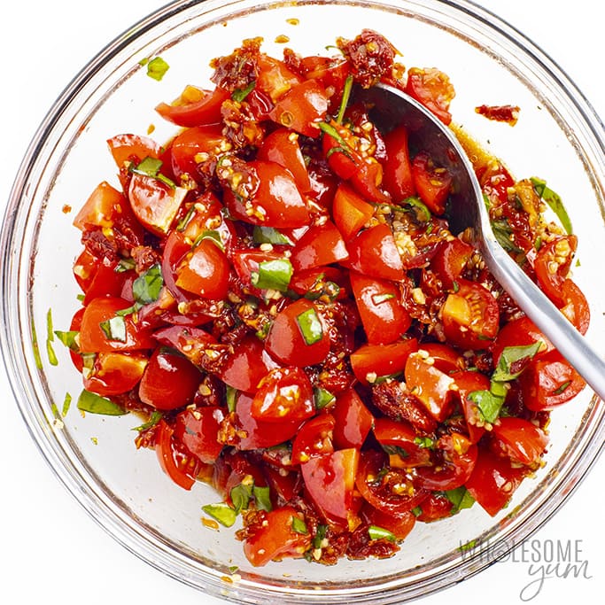 Topping for grilled bruschetta chicken in a bowl