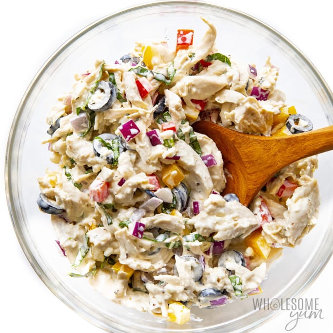 Chicken salad in a bowl with spoon