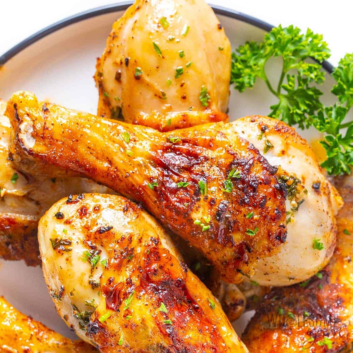 Juicy and crispy air fryer chicken legs close up