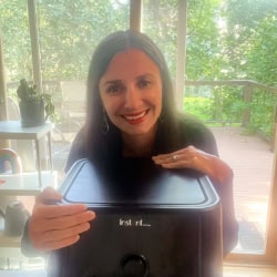 Me with my air fryer that I love so much.