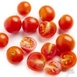 Are cherry tomatoes keto? These whole, raw cherry tomatoes in a bowl are keto.
