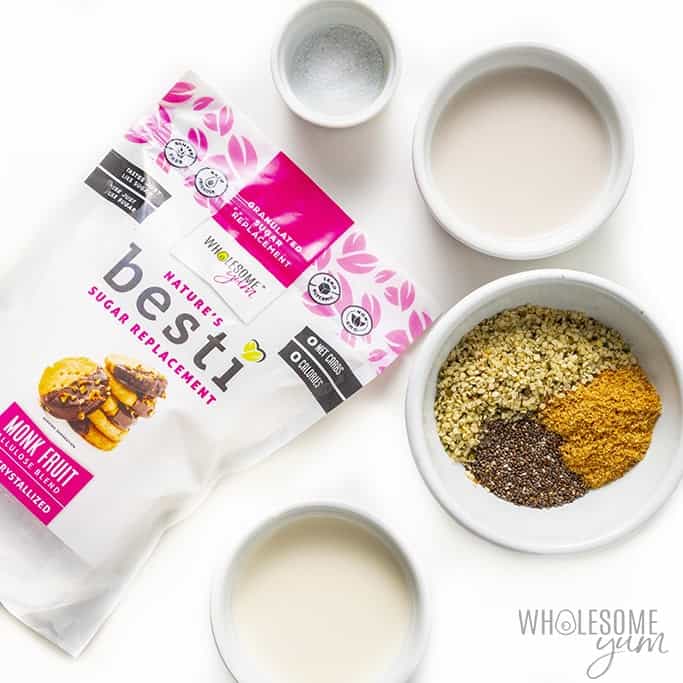 Keto overnight oats ingredients in bowls with bag of Besti sweetener