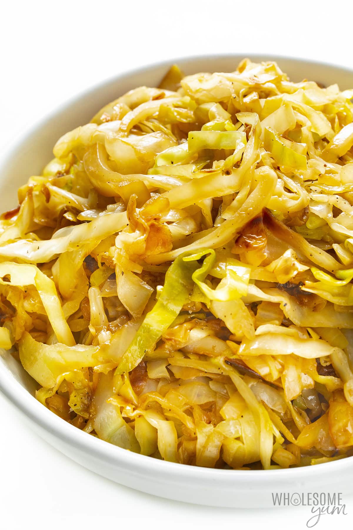 Cooked cabbage in a bowl.