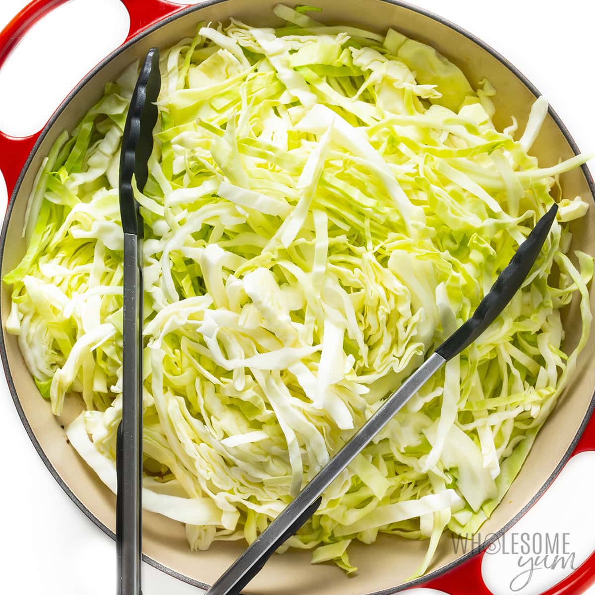 Cabbage sauteing in pan.
