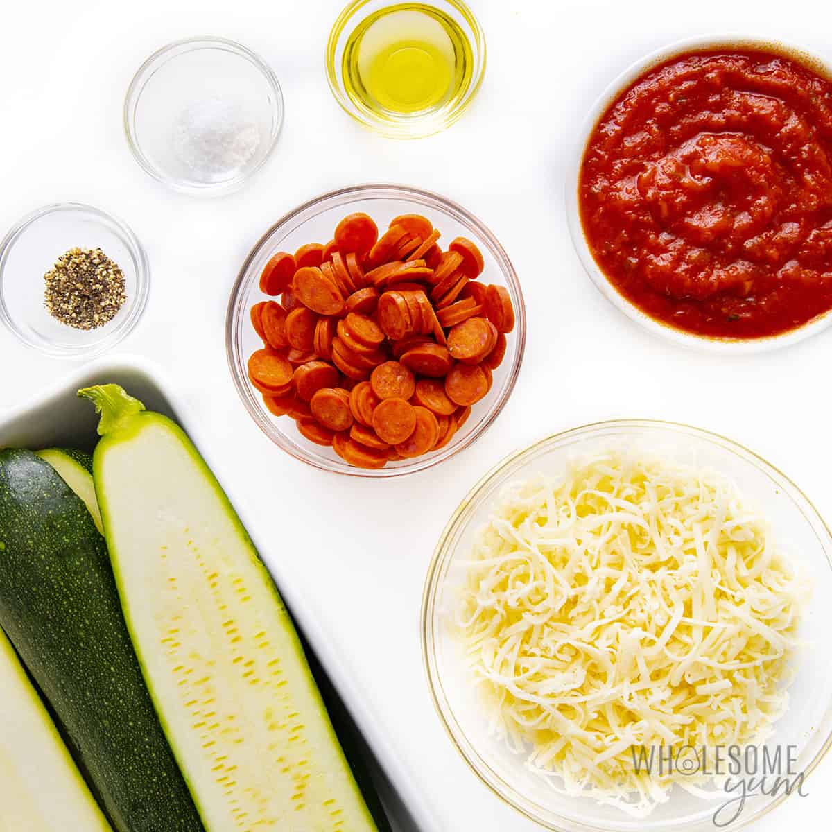 Ingredients to make zucchini pizza boats