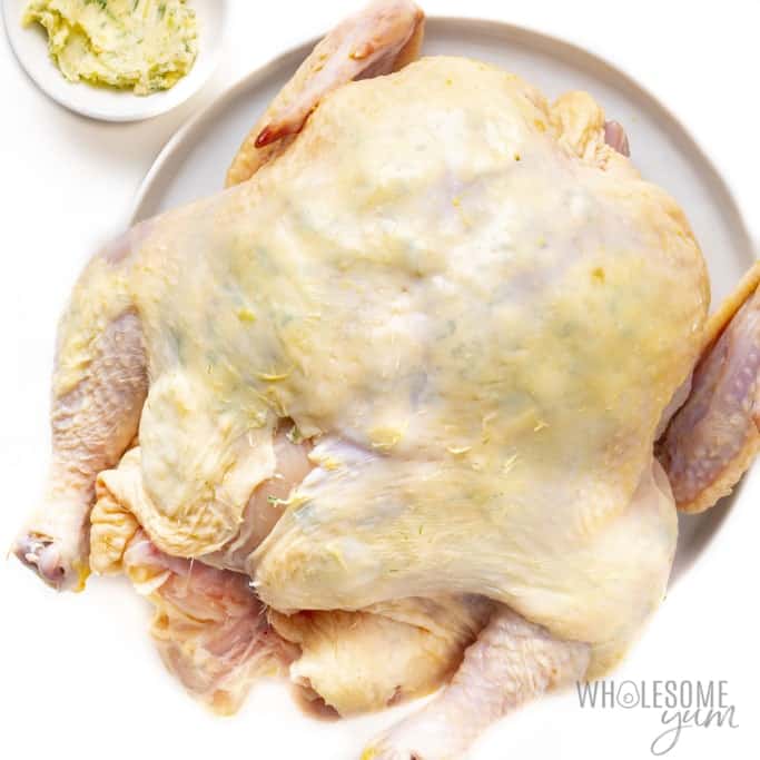 Raw chicken with butter under skin