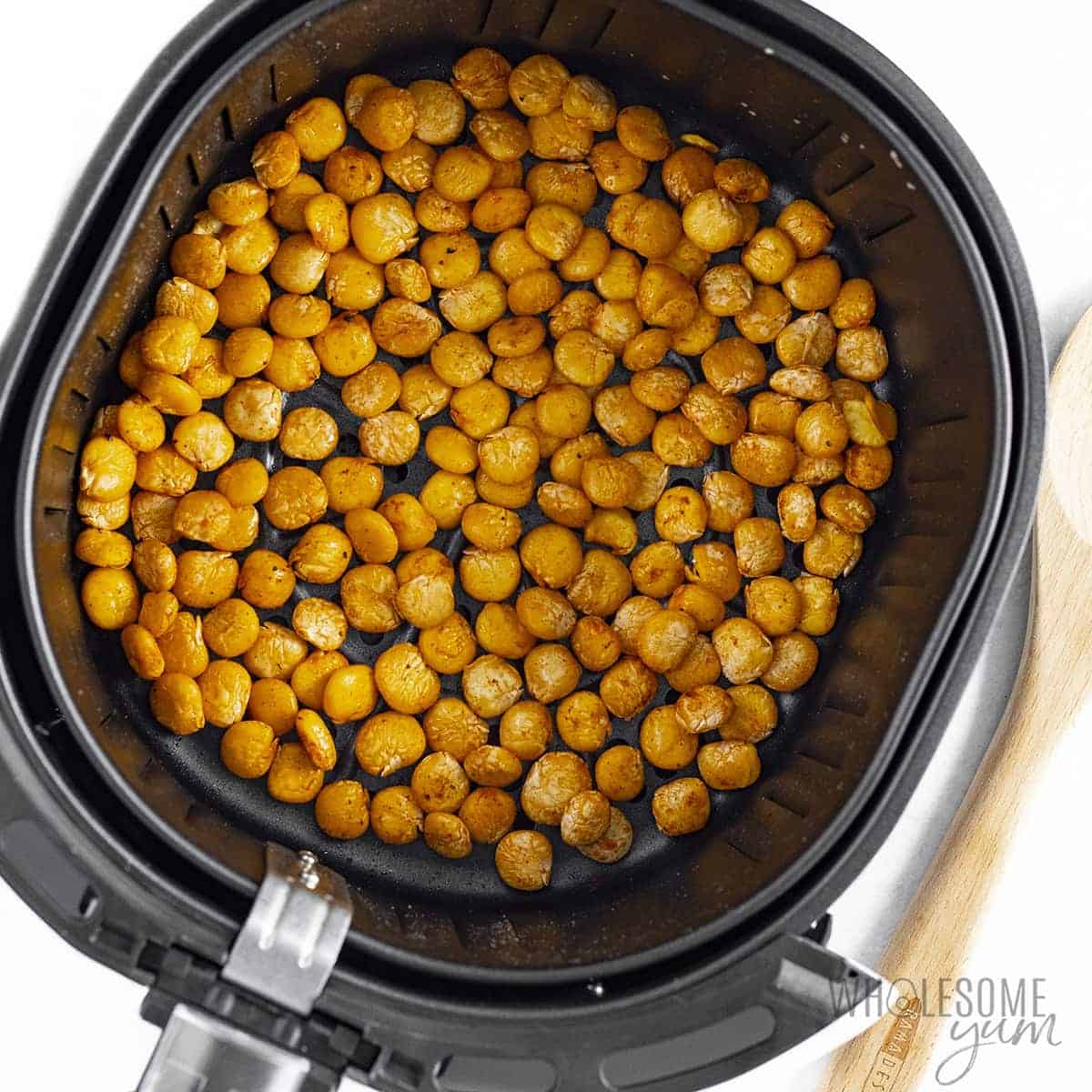 Finished lupini beans in air fryer basket