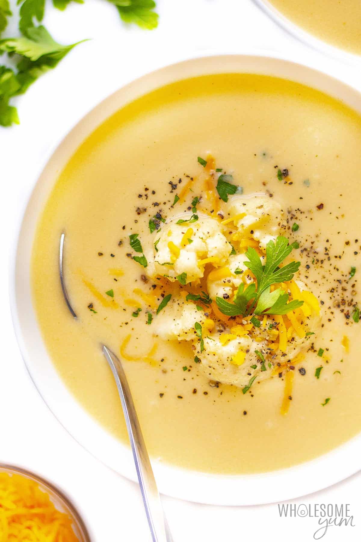Bowl of cheesy cauliflower soup