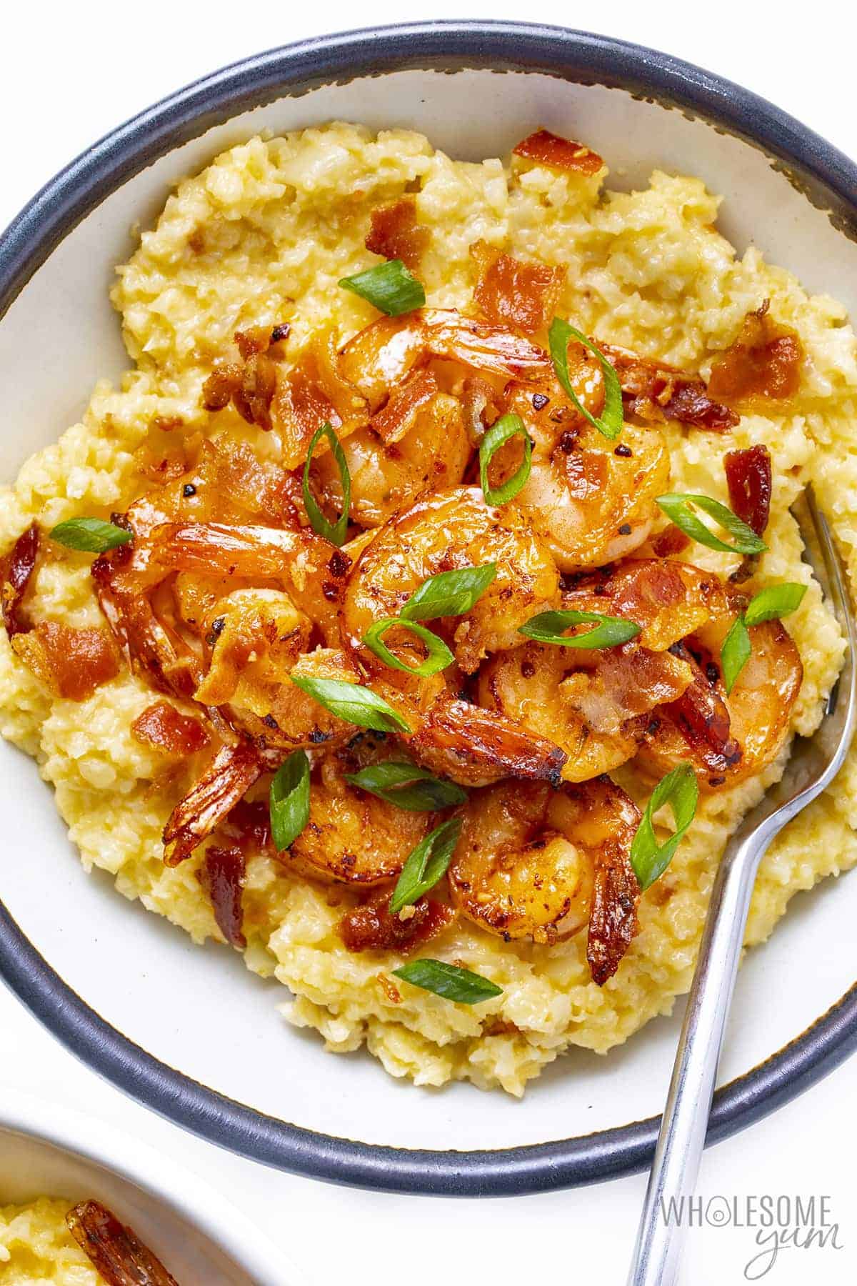 Overhead view of low carb shrimp and grits in a bowl