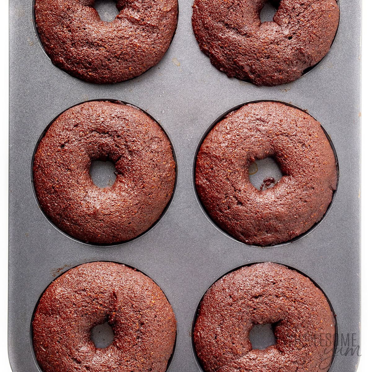 Baked protein donuts in the donut pan.