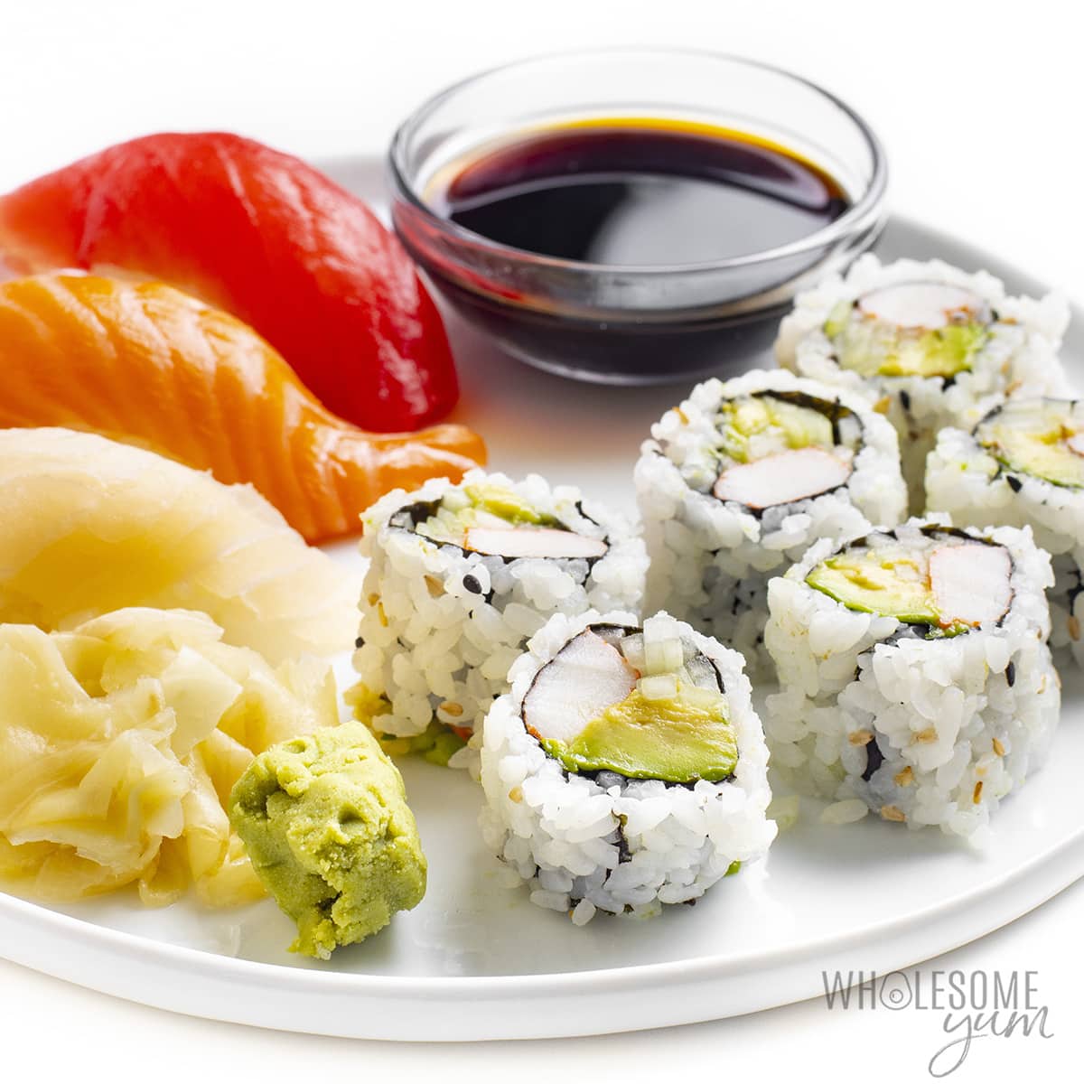 Premium Photo  Fresh made sushi roll set with soy sauce, sesame