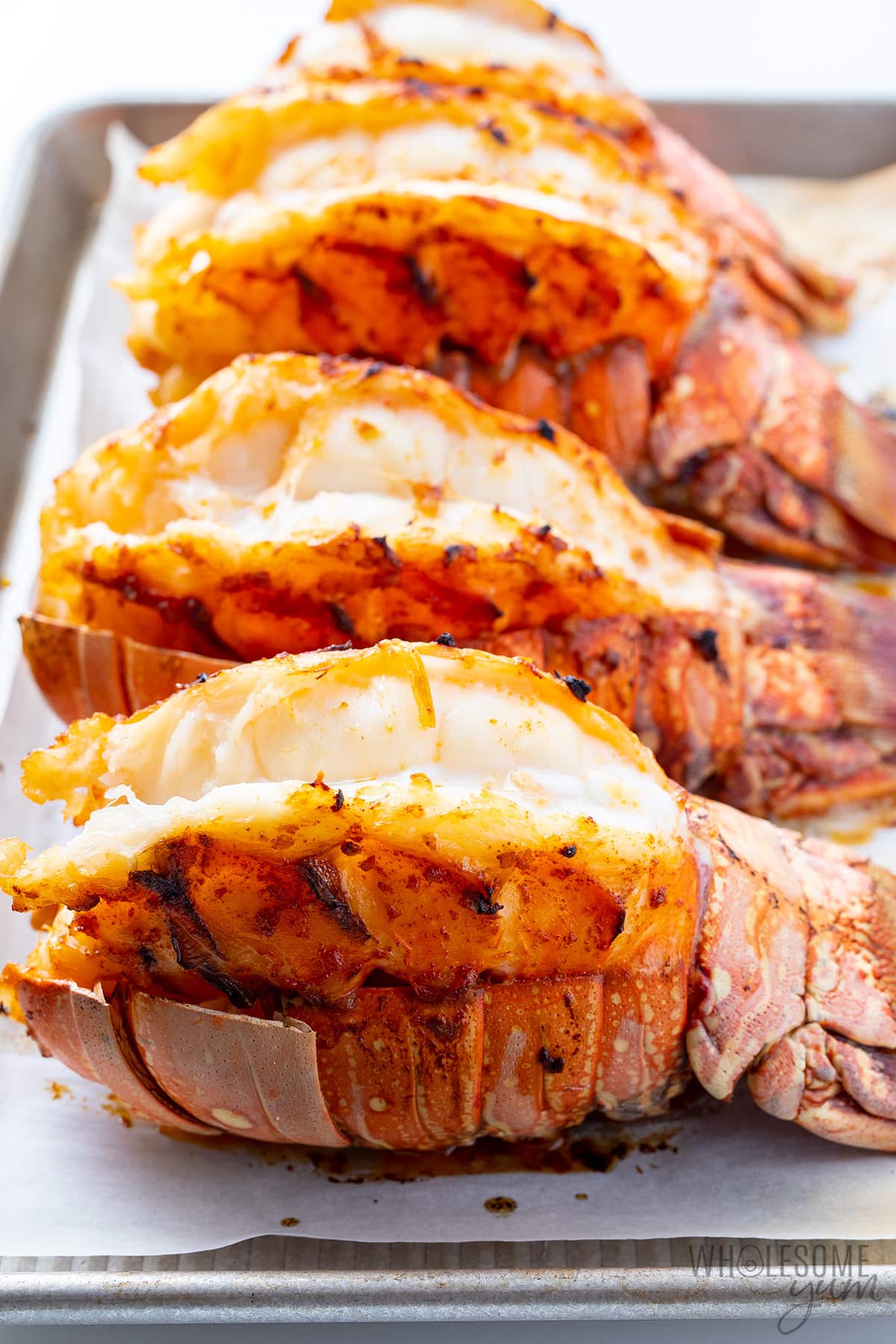 Learn how to cook lobster perfectly every time, just like the tails shown here, using my broiling method.