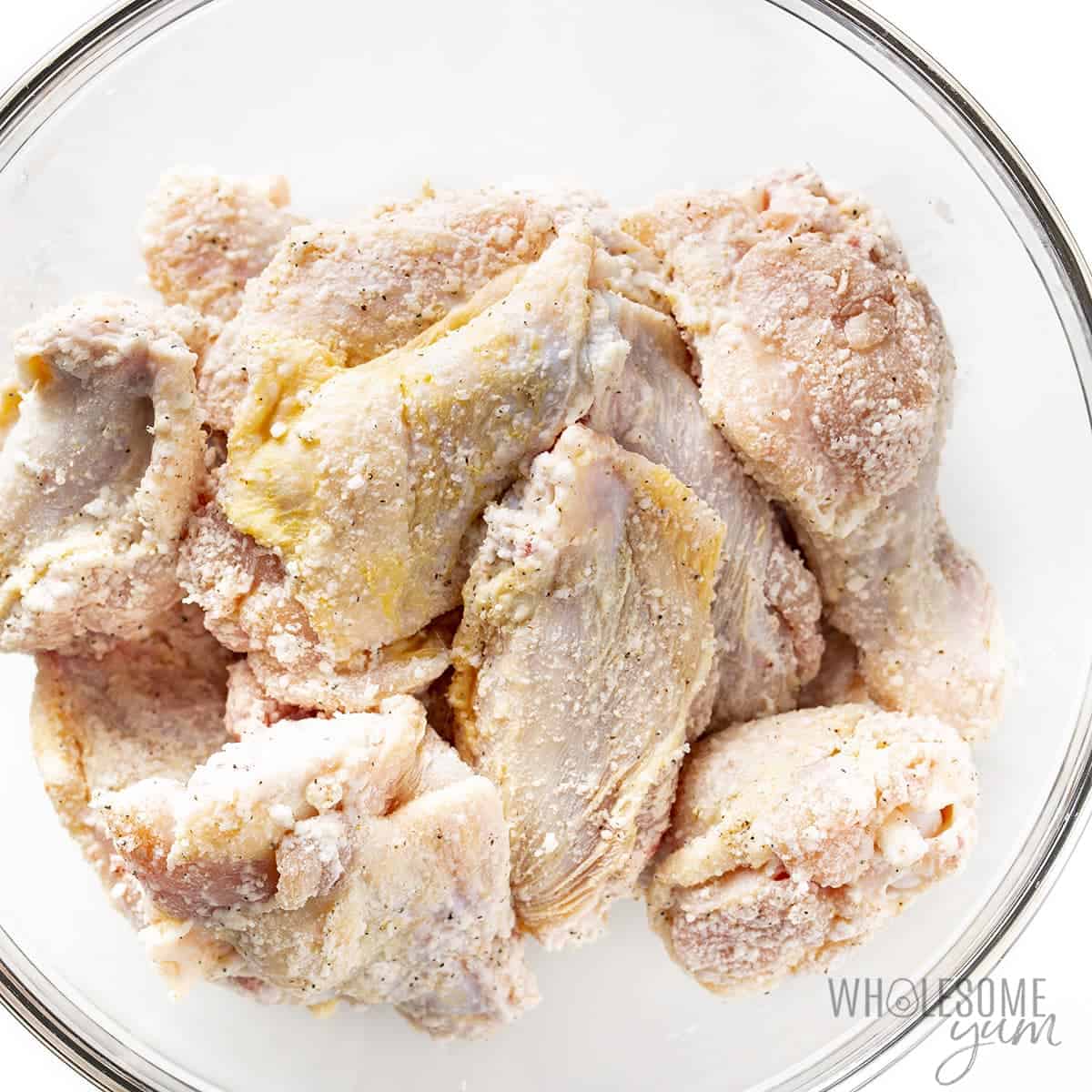 Seasoned chicken wings in a bowl