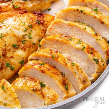 Sliced air fryer chicken breast on a plate
