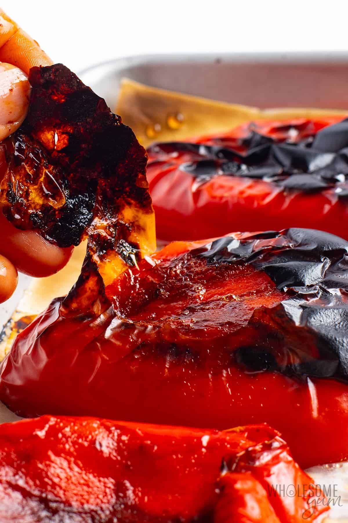 Peeling roasted red peppers