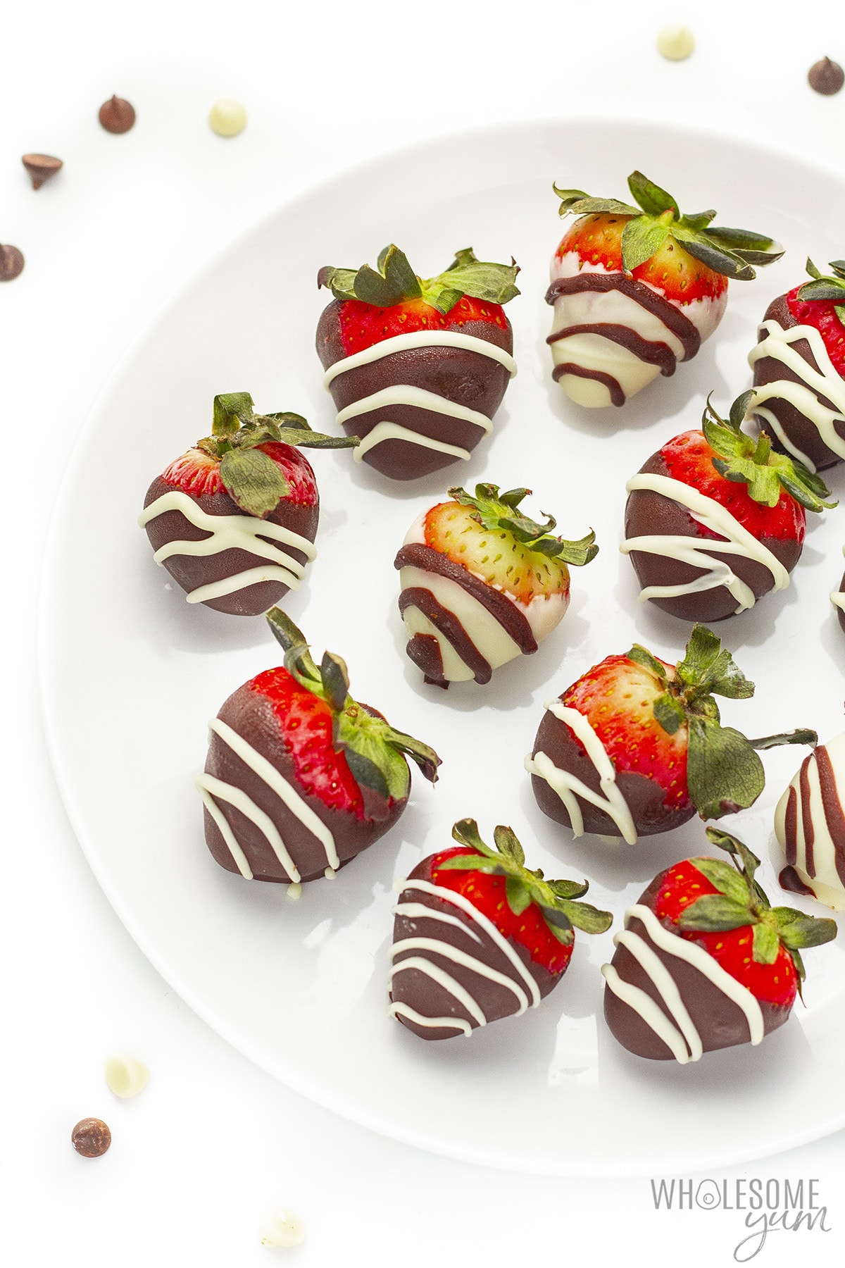Keto chocolate covered strawberries on a plate.