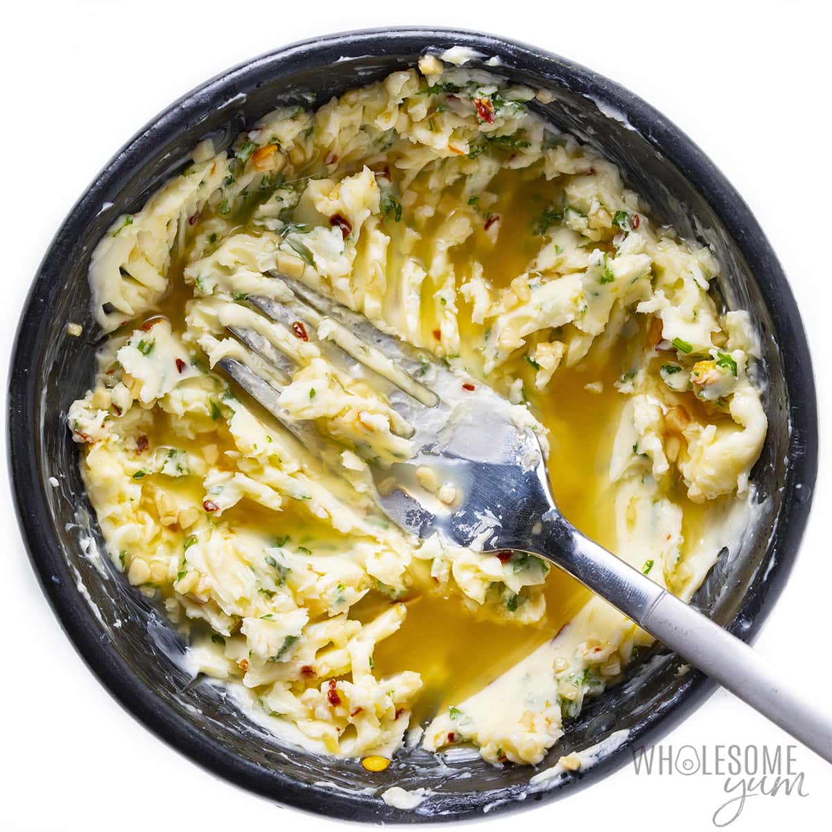 Garlic butter mashed in a bowl.