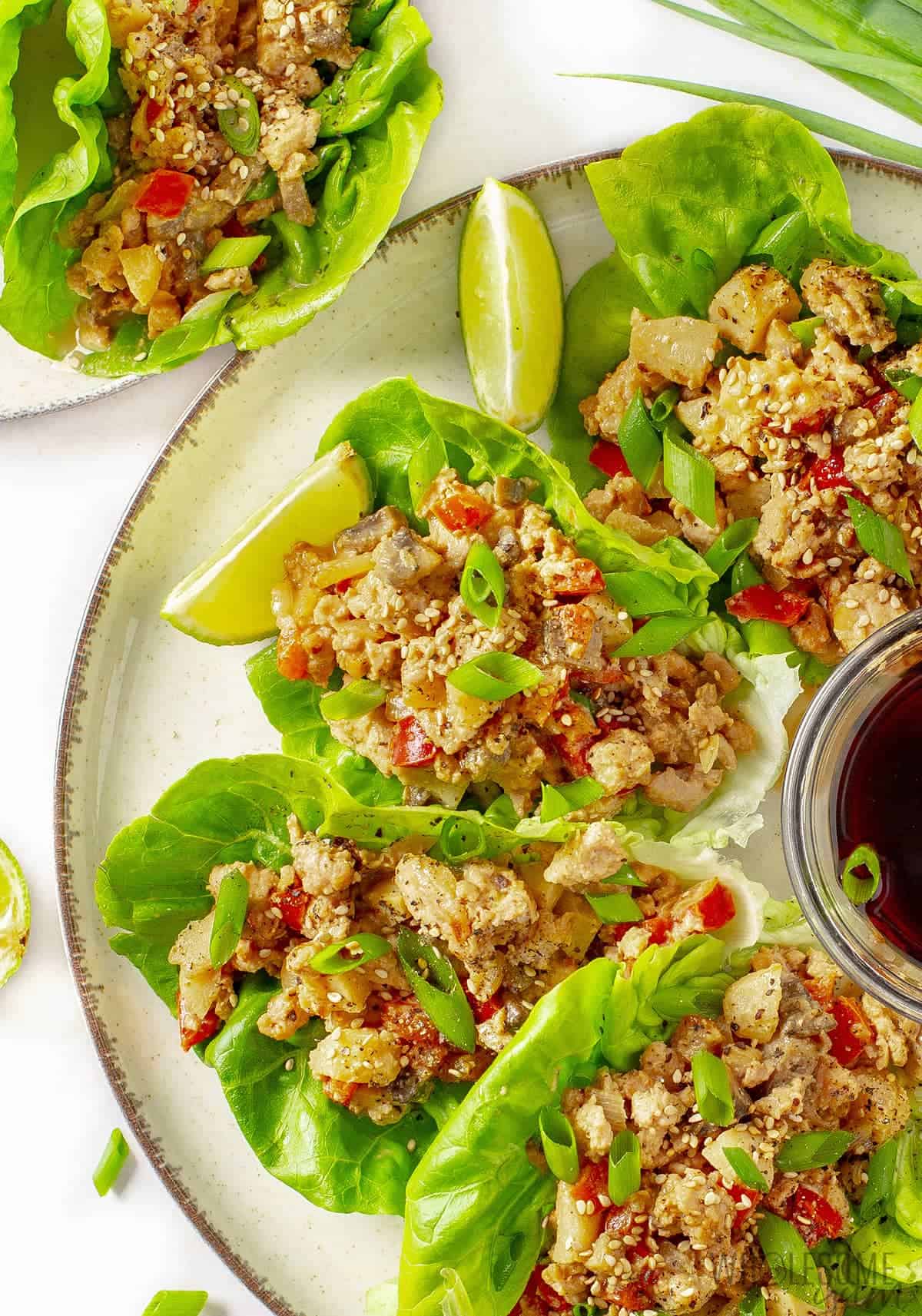 Plate with chicken lettuce wraps.